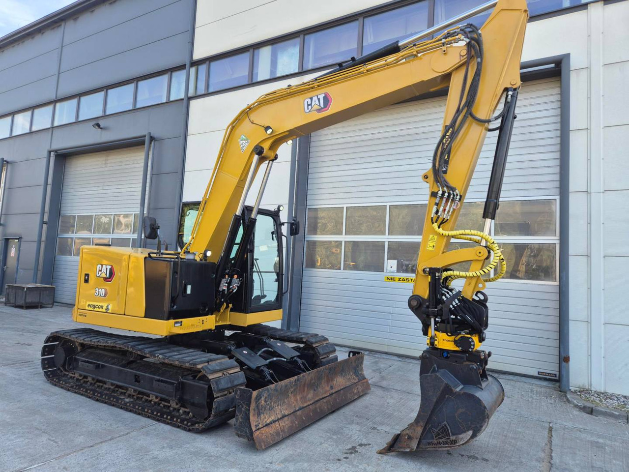 CAT 310 - Ekskavator perayap: gambar 2 CAT 310 - Ekskavator perayap: gambar 2