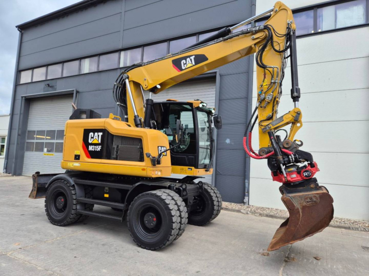 CAT M315F - Ekskavator roda: gambar 2 CAT M315F - Ekskavator roda: gambar 2