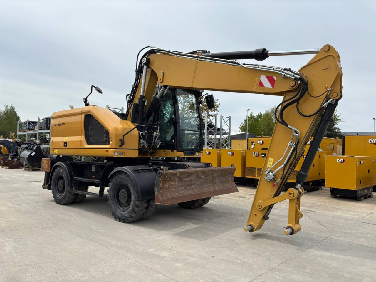 CAT M318 - Ekskavator roda: gambar 3 CAT M318 - Ekskavator roda: gambar 3