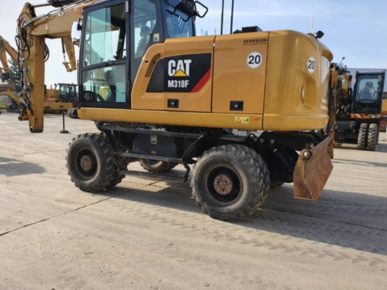 CAT M318F - Ekskavator roda: gambar 4 CAT M318F - Ekskavator roda: gambar 4