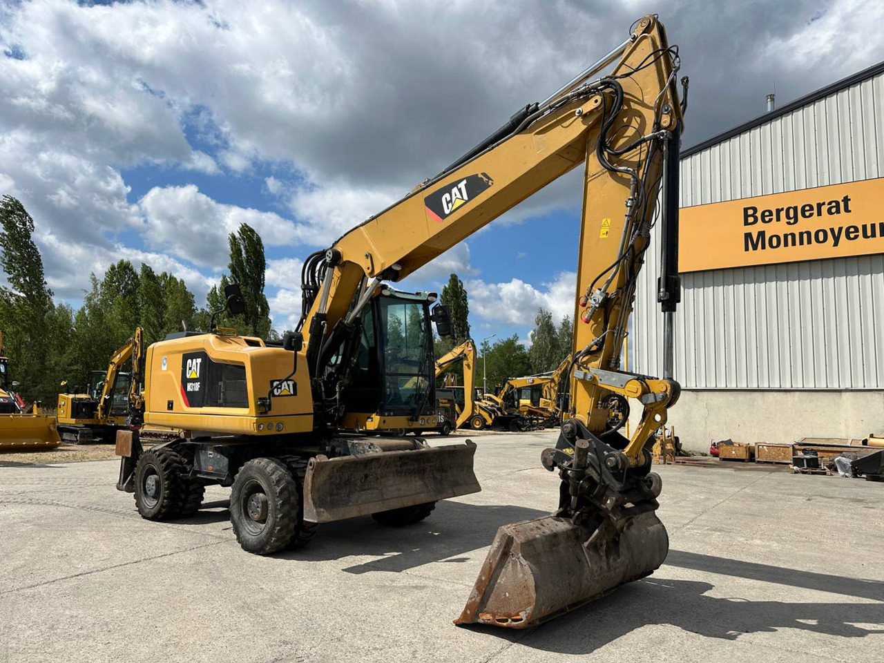 CAT M318F - Ekskavator roda: gambar 2 CAT M318F - Ekskavator roda: gambar 2