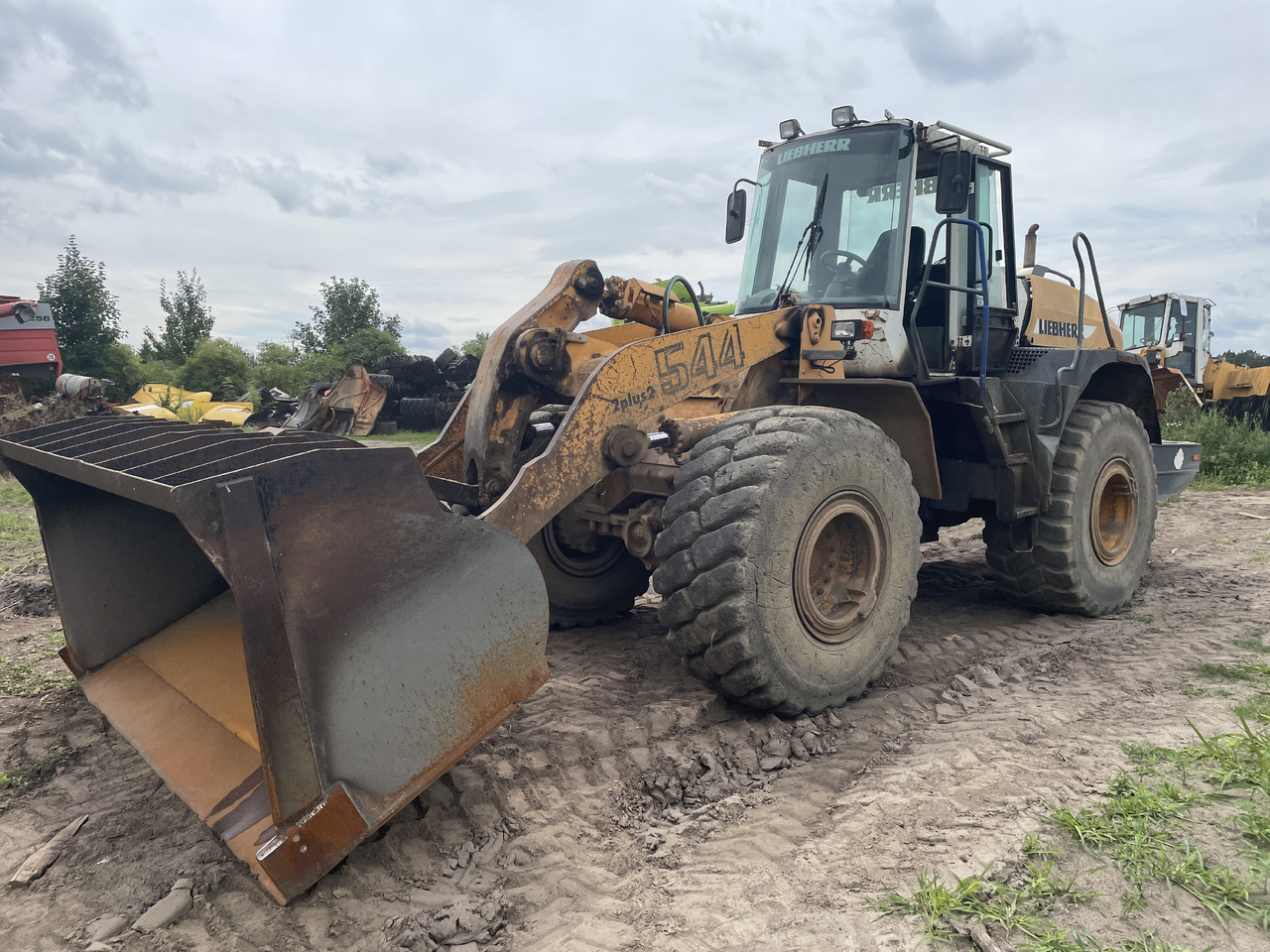 Liebherr L544 - koło felga opona - Pelek untuk Peralatan pertanian: gambar 1 Liebherr L544 - koło felga opona - Pelek untuk Peralatan pertanian: gambar 1
