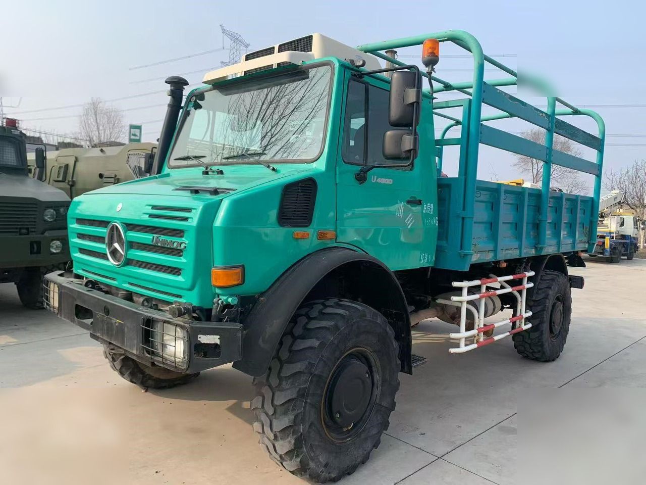 2009 MERCEDES-BENZ UNIMOG 4000 - Truk flatbed: gambar 2 2009 MERCEDES-BENZ UNIMOG 4000 - Truk flatbed: gambar 2
