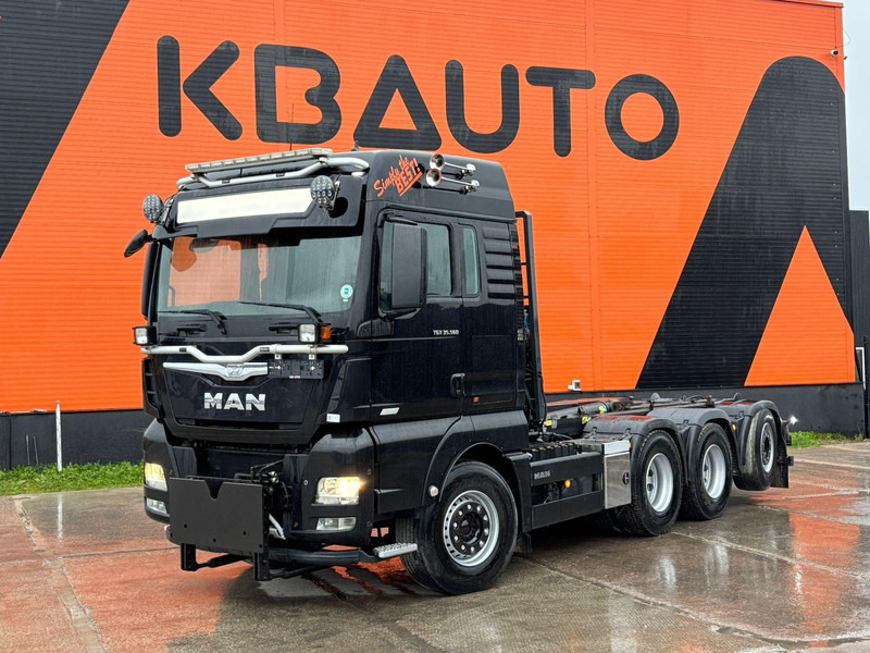 MAN TGX 35.560 8x4*4 LOW MILEAGE ! / INTARDER / JOAB 24 ton / L=5600 mm / SNOW PLOW EQUIPMENT - Hook lift: gambar 1 MAN TGX 35.560 8x4*4 LOW MILEAGE ! / INTARDER / JOAB 24 ton / L=5600 mm / SNOW PLOW EQUIPMENT - Hook lift: gambar 1
