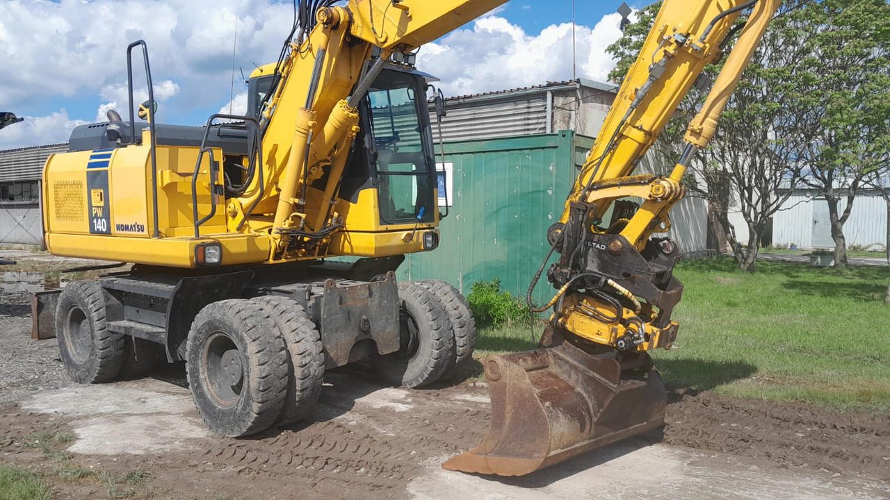KOMATSU PW 140-7 - Ekskavator roda: gambar 4 KOMATSU PW 140-7 - Ekskavator roda: gambar 4