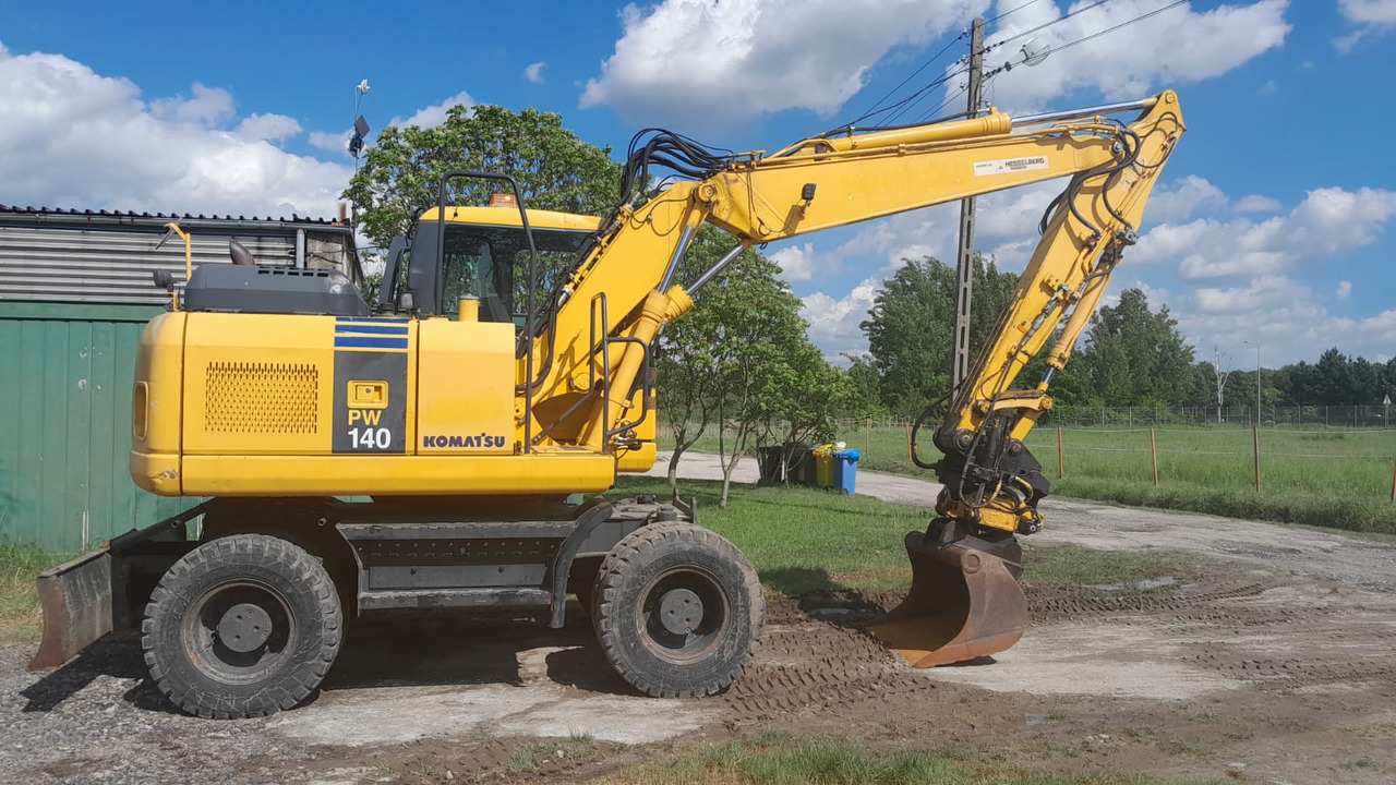 KOMATSU PW 140-7 - Ekskavator roda: gambar 1 KOMATSU PW 140-7 - Ekskavator roda: gambar 1
