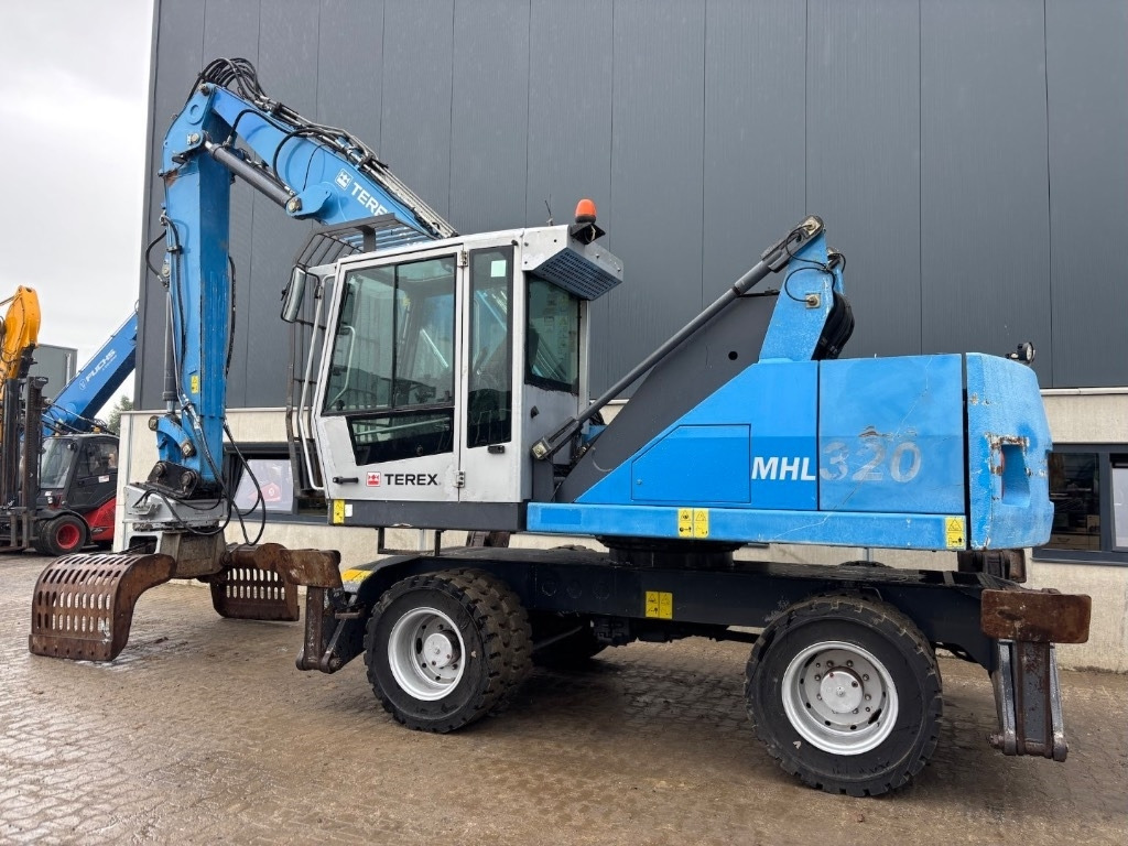 Fuchs MHL 320 D - Mesin pengisi: gambar 4 Fuchs MHL 320 D - Mesin pengisi: gambar 4