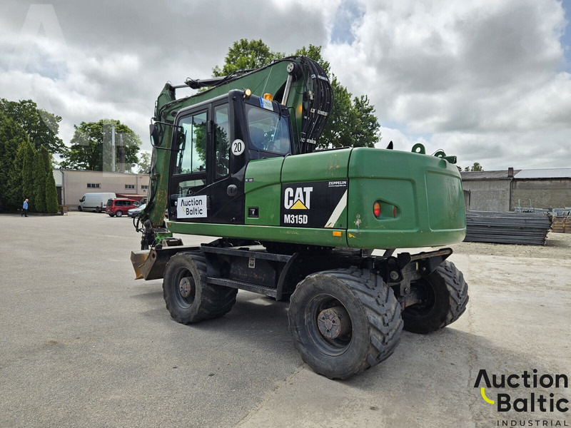 Caterpillar M315D - Ekskavator roda: gambar 4 Caterpillar M315D - Ekskavator roda: gambar 4
