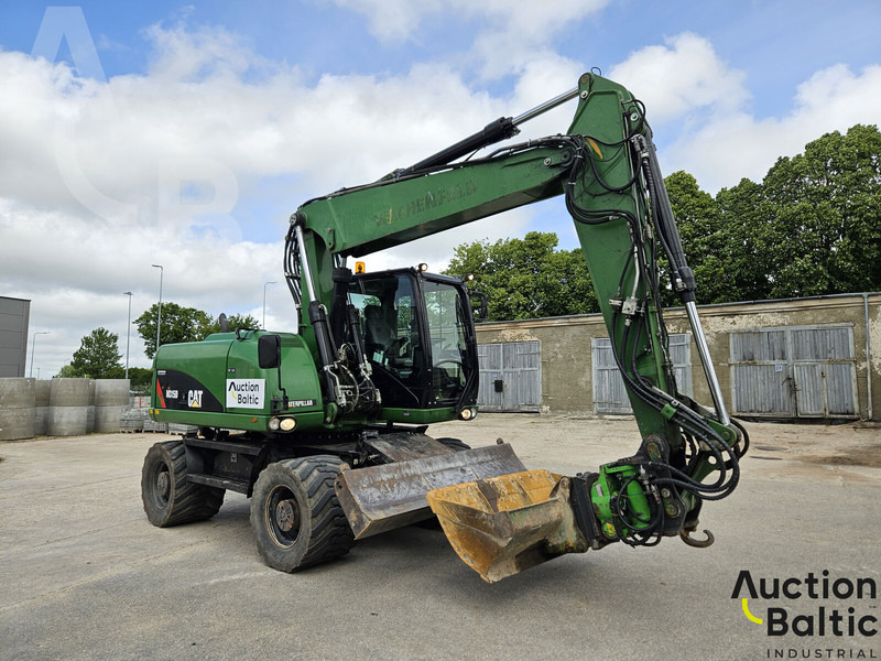 Caterpillar M315D - Ekskavator roda: gambar 1 Caterpillar M315D - Ekskavator roda: gambar 1