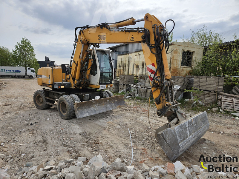 Liebherr A 316 Litronic - Ekskavator roda: gambar 2 Liebherr A 316 Litronic - Ekskavator roda: gambar 2