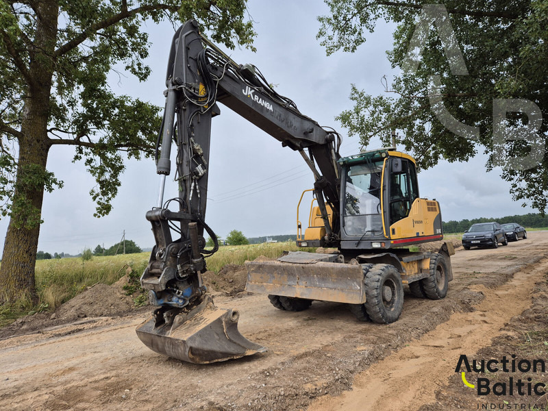 Volvo EW 140 C - Ekskavator roda: gambar 1 Volvo EW 140 C - Ekskavator roda: gambar 1