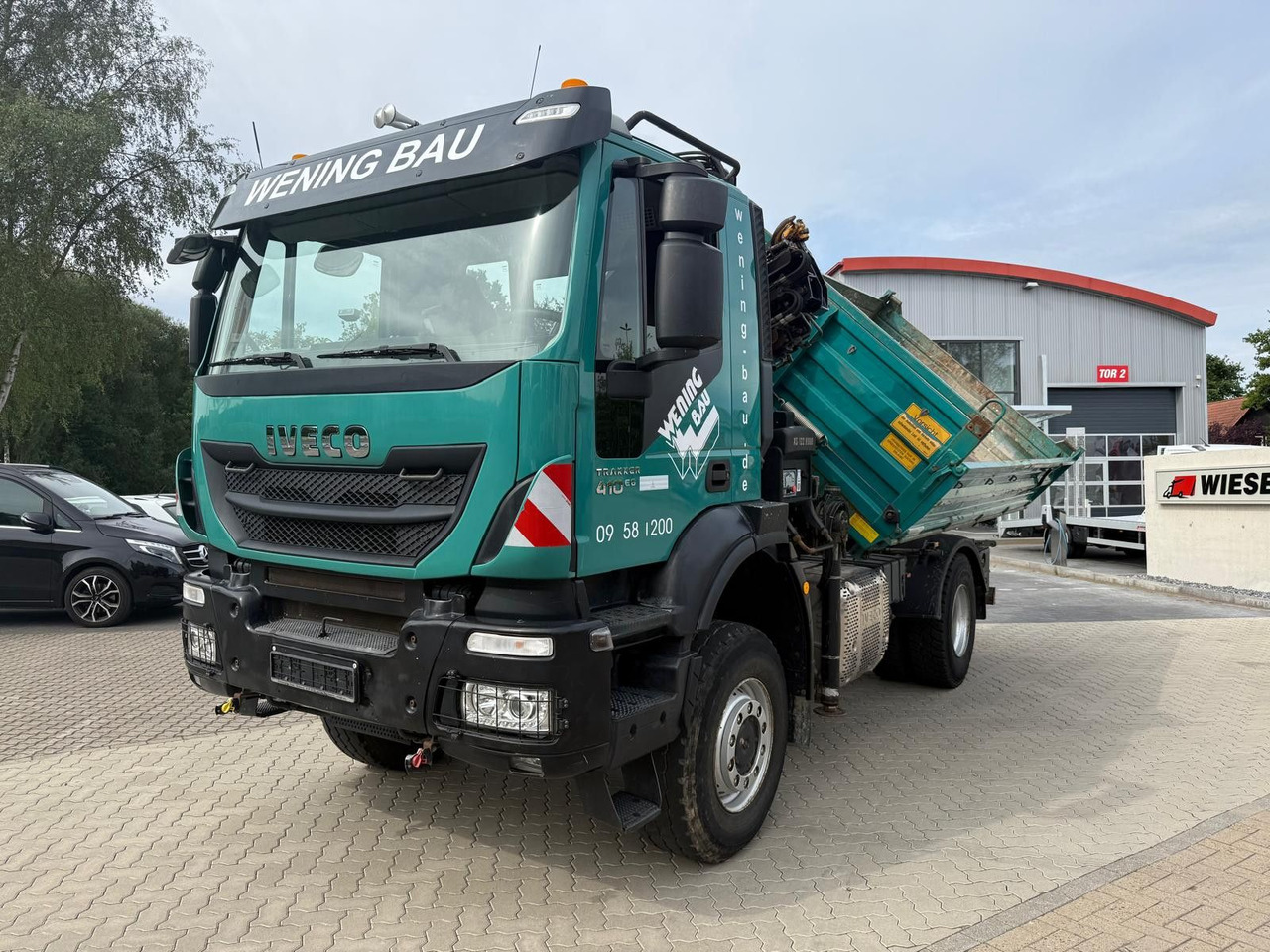 Iveco AD190 T/W Trakker 410 4x4 Allrad Kran KipperHIAB - Truk jungkit, Truk derek: gambar 1 Iveco AD190 T/W Trakker 410 4x4 Allrad Kran KipperHIAB - Truk jungkit, Truk derek: gambar 1