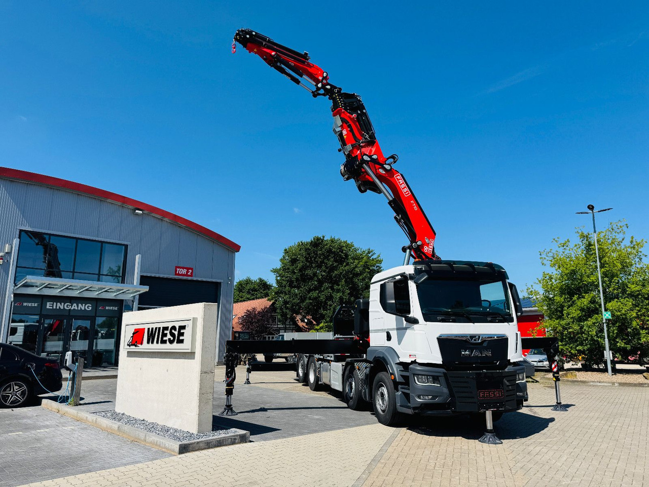 MAN TGS 32.510 mit F710 Frontkran sofort - Truk flatbed, Truk derek: gambar 1 MAN TGS 32.510 mit F710 Frontkran sofort - Truk flatbed, Truk derek: gambar 1
