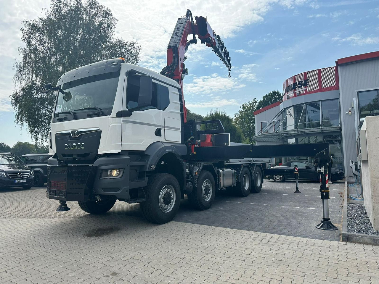 MAN TGS 41.520 8x8 mit Fassi Ladekran F710RA.2.26 - Truk flatbed: gambar 2 MAN TGS 41.520 8x8 mit Fassi Ladekran F710RA.2.26 - Truk flatbed: gambar 2
