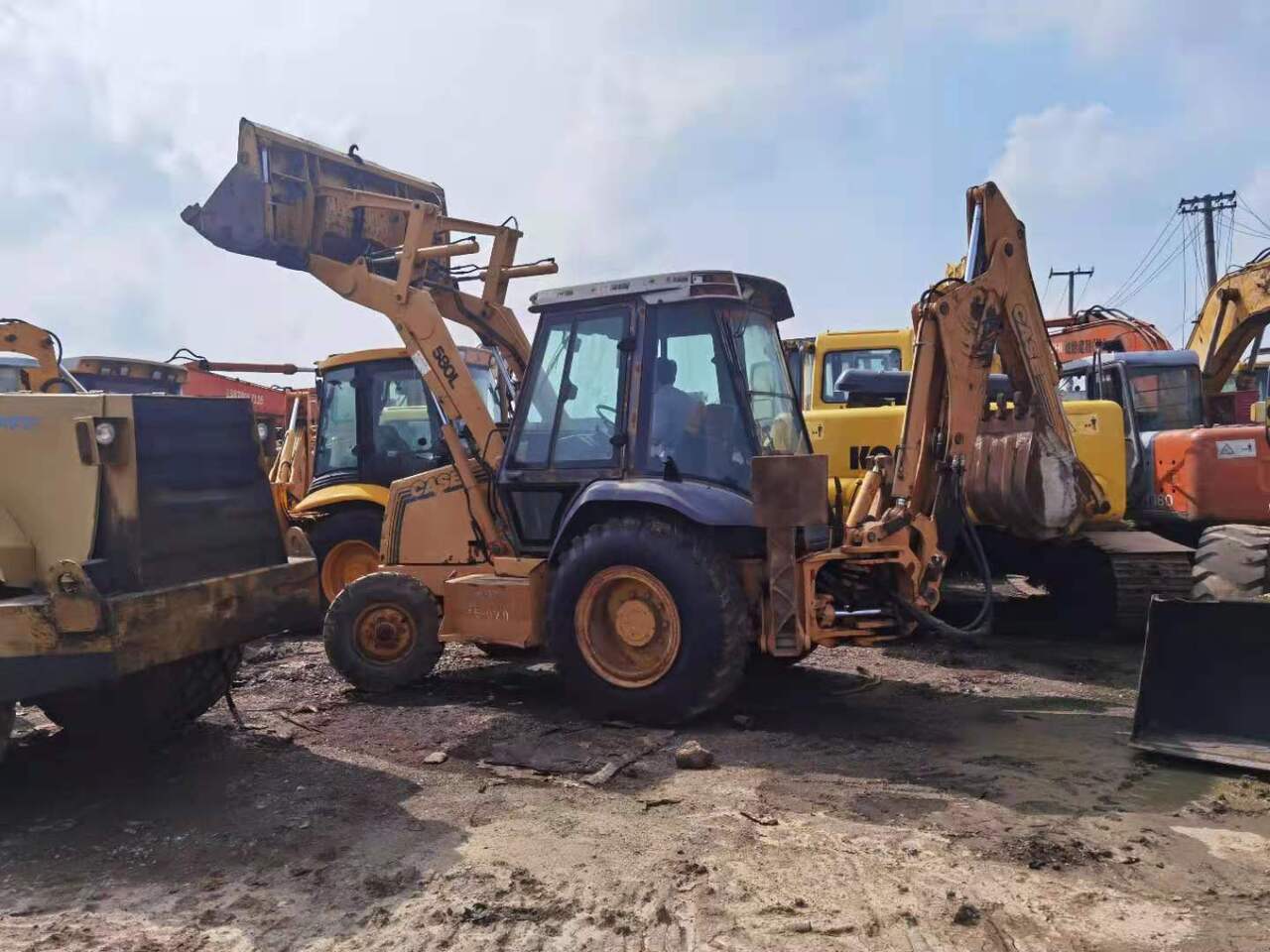 CASE 580L - Backhoe loader: gambar 1 CASE 580L - Backhoe loader: gambar 1