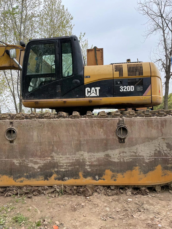 CATERPILLAR 320D - Ekskavator amfibi: gambar 1 CATERPILLAR 320D - Ekskavator amfibi: gambar 1