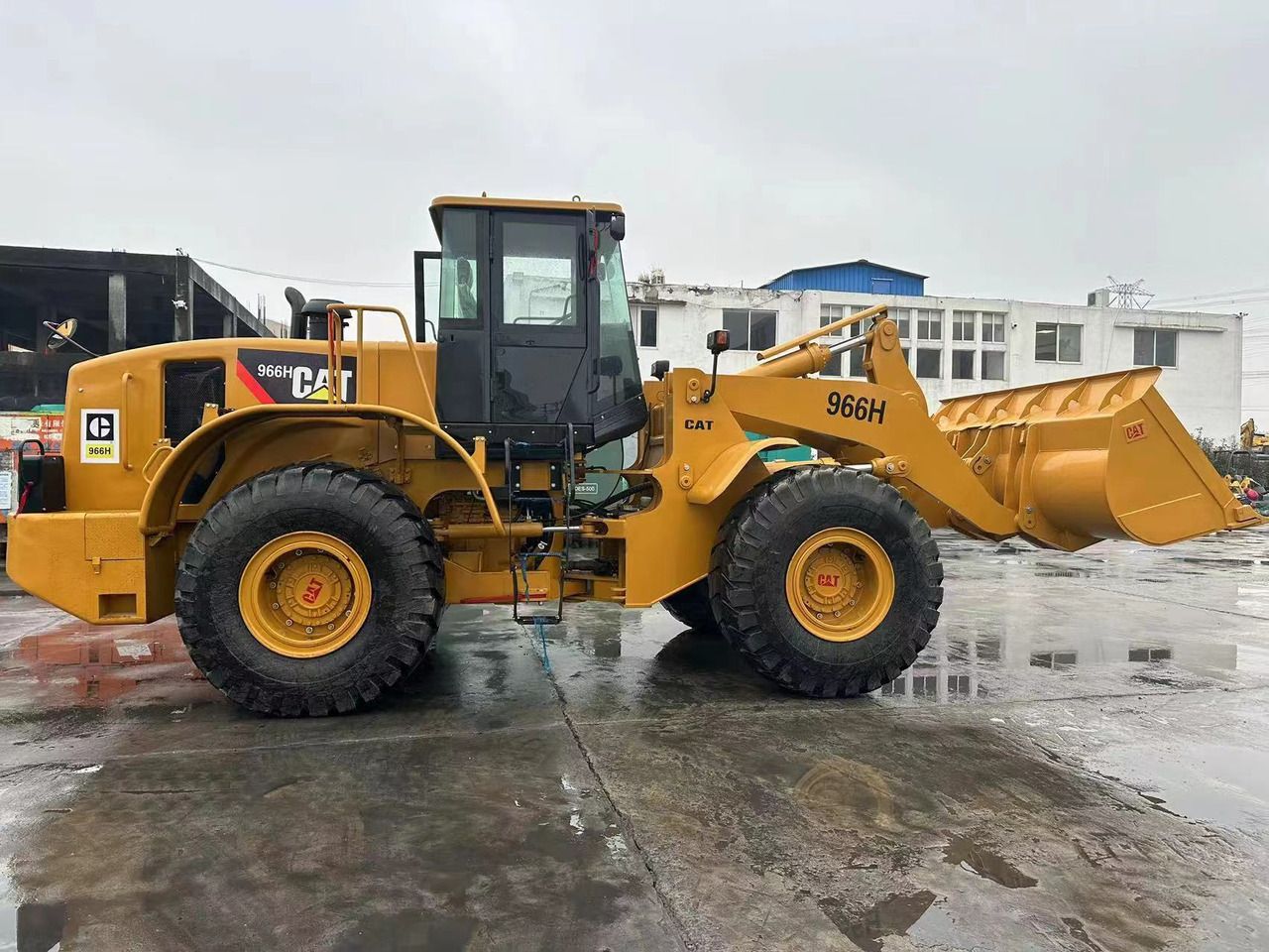 CATERPILLAR 966H - Ekskavator roda: gambar 1 CATERPILLAR 966H - Ekskavator roda: gambar 1