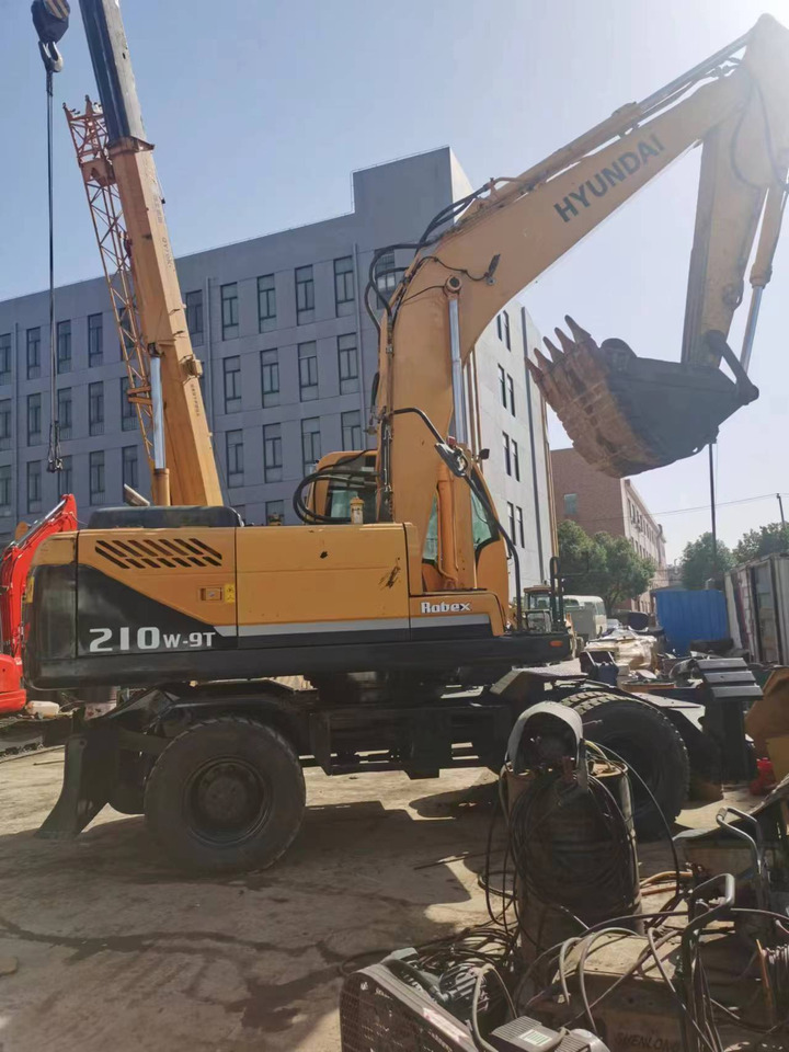 HYUNDAI 210W-9 - Ekskavator roda: gambar 1 HYUNDAI 210W-9 - Ekskavator roda: gambar 1
