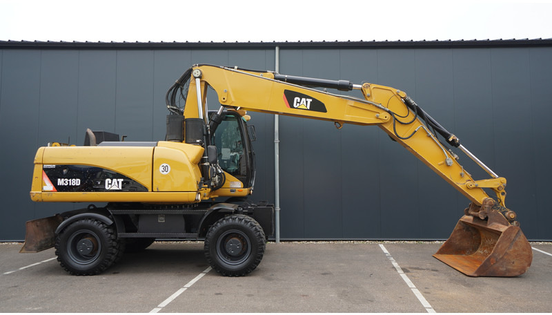 Caterpillar M318D 4X4 WHEELED EXCAVATOR - Peralatan konstruksi: gambar 2 Caterpillar M318D 4X4 WHEELED EXCAVATOR - Peralatan konstruksi: gambar 2