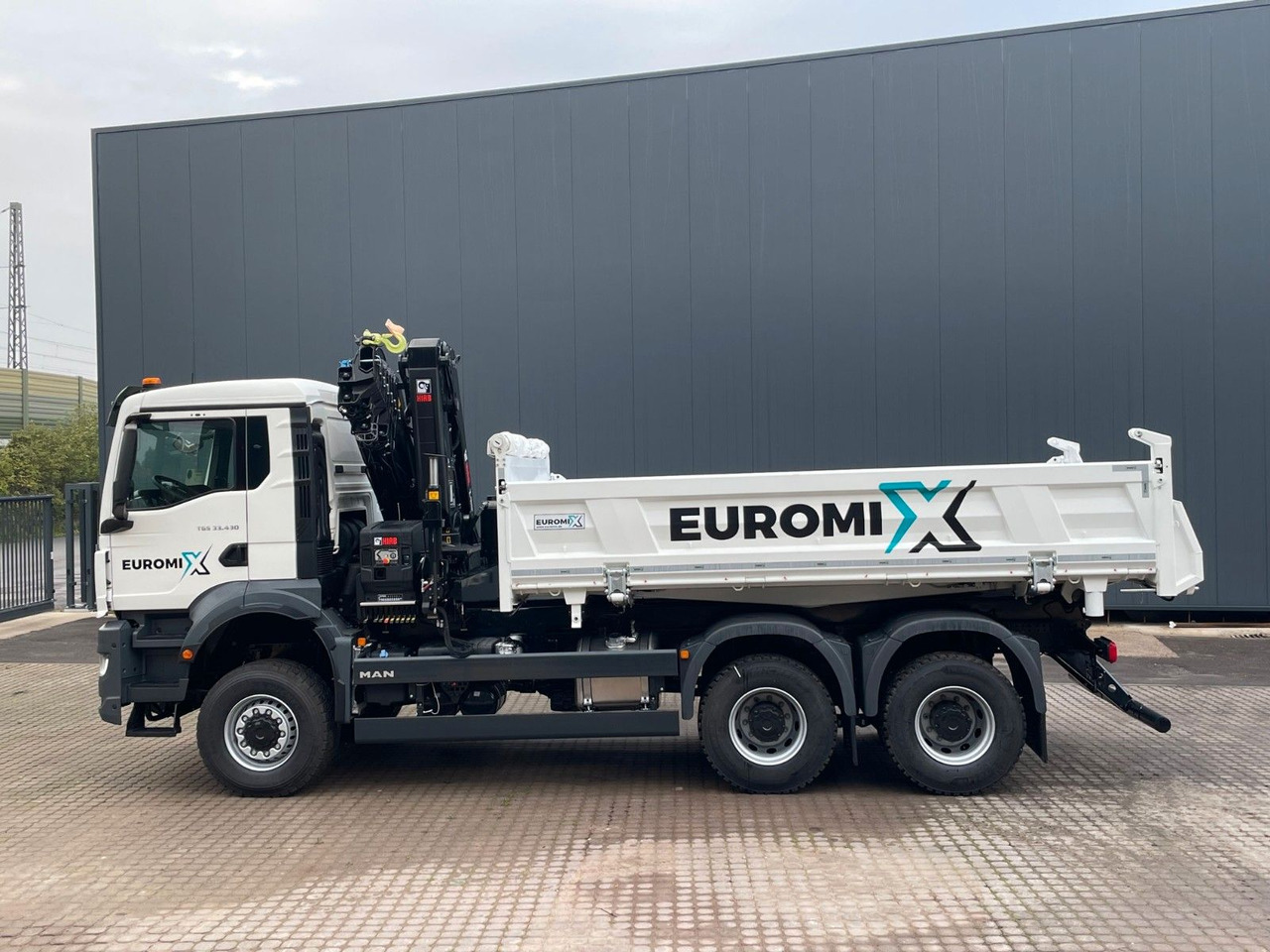 MAN TGS 33.440 6x6 /3-Seiten- Kipper / HIAB 228-6 - Truk jungkit, Truk derek: gambar 2 MAN TGS 33.440 6x6 /3-Seiten- Kipper / HIAB 228-6 - Truk jungkit, Truk derek: gambar 2