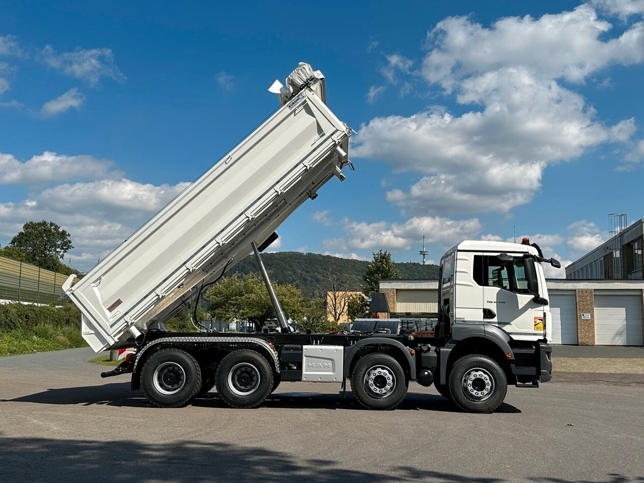 Truk jungkit MAN TGS 41.440  8x4 EuromixMTP 3-Seiten-Kipper: gambar 13
