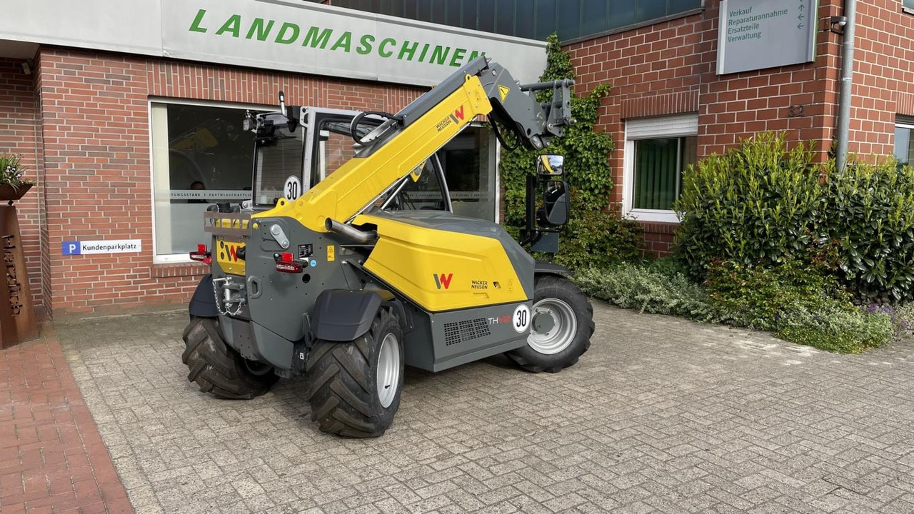Loader konstruksi baru Wacker TH 412: gambar 20