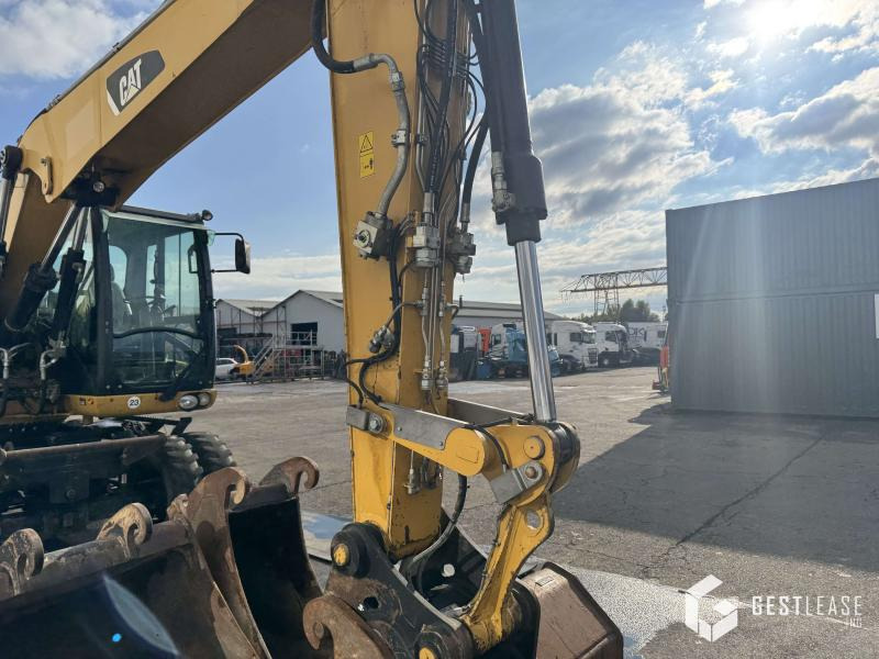 Caterpillar M313D - Ekskavator roda: gambar 5 Caterpillar M313D - Ekskavator roda: gambar 5