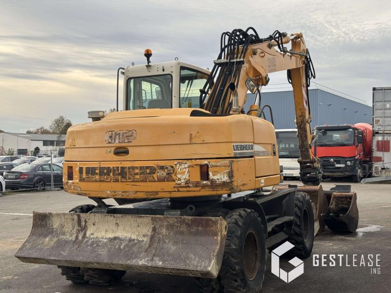 Liebherr A312 Litronic - Ekskavator roda: gambar 3 Liebherr A312 Litronic - Ekskavator roda: gambar 3