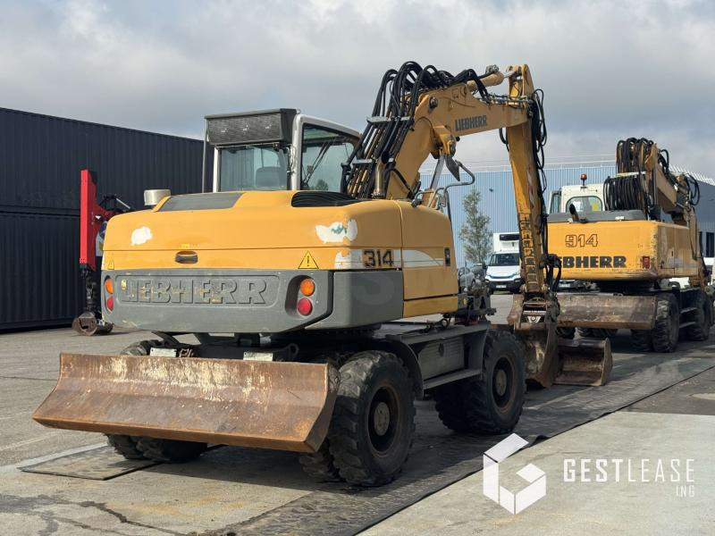 Liebherr A314 Litronic - Ekskavator roda: gambar 4 Liebherr A314 Litronic - Ekskavator roda: gambar 4