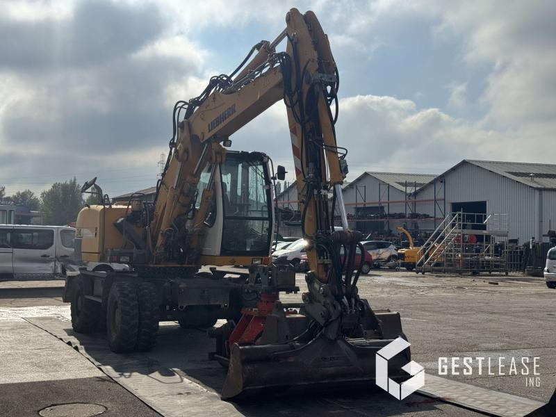 Liebherr A314 Litronic - Ekskavator roda: gambar 5 Liebherr A314 Litronic - Ekskavator roda: gambar 5