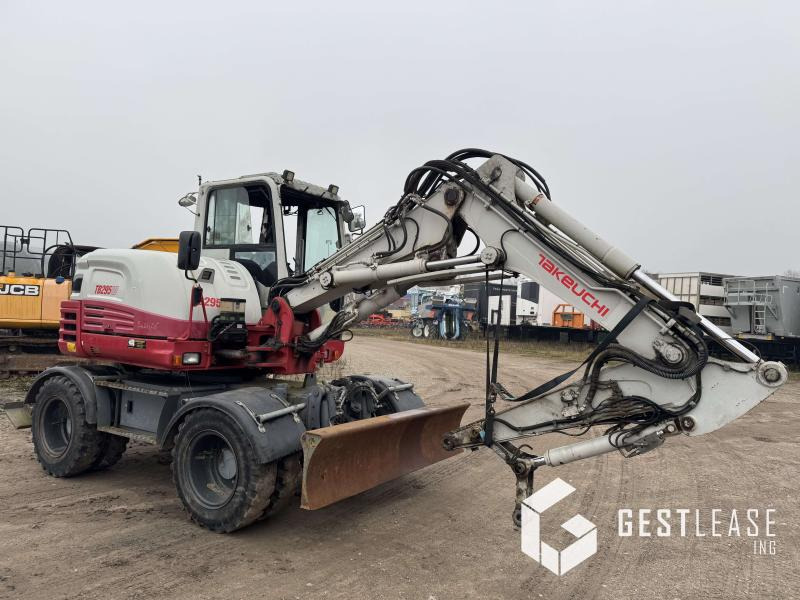 Takeuchi TB295W - Ekskavator roda: gambar 4 Takeuchi TB295W - Ekskavator roda: gambar 4
