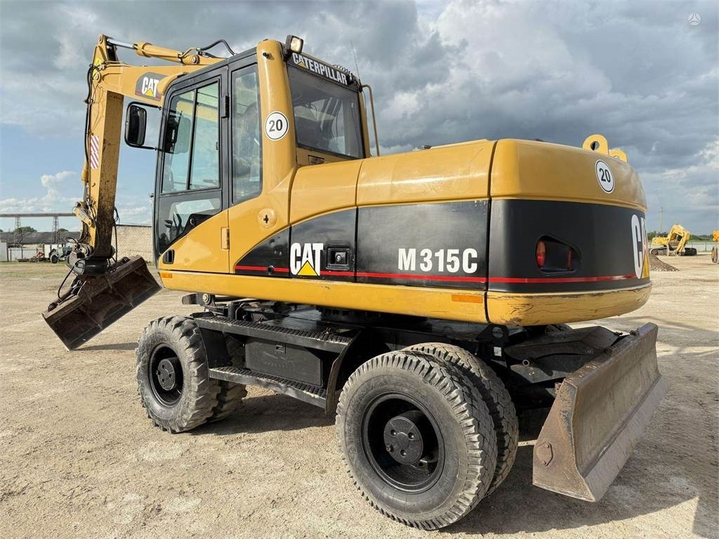 CAT M315C - Ekskavator roda: gambar 1 CAT M315C - Ekskavator roda: gambar 1