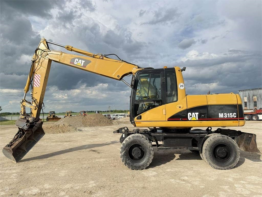 CAT M315C - Ekskavator roda: gambar 4 CAT M315C - Ekskavator roda: gambar 4
