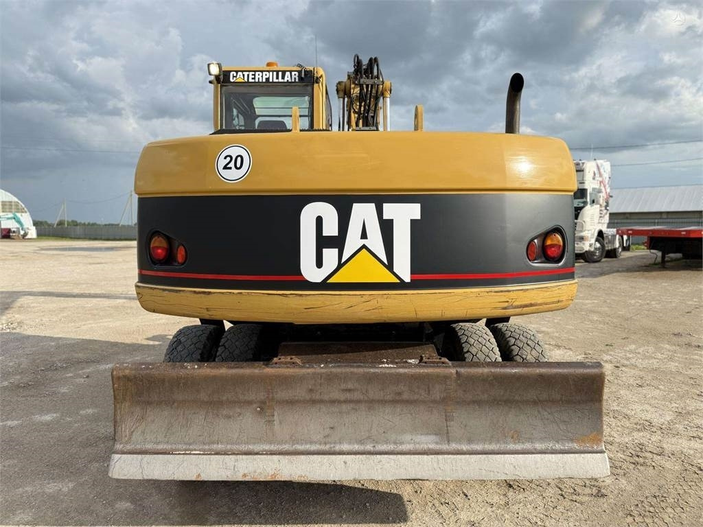 CAT M315C - Ekskavator roda: gambar 5 CAT M315C - Ekskavator roda: gambar 5