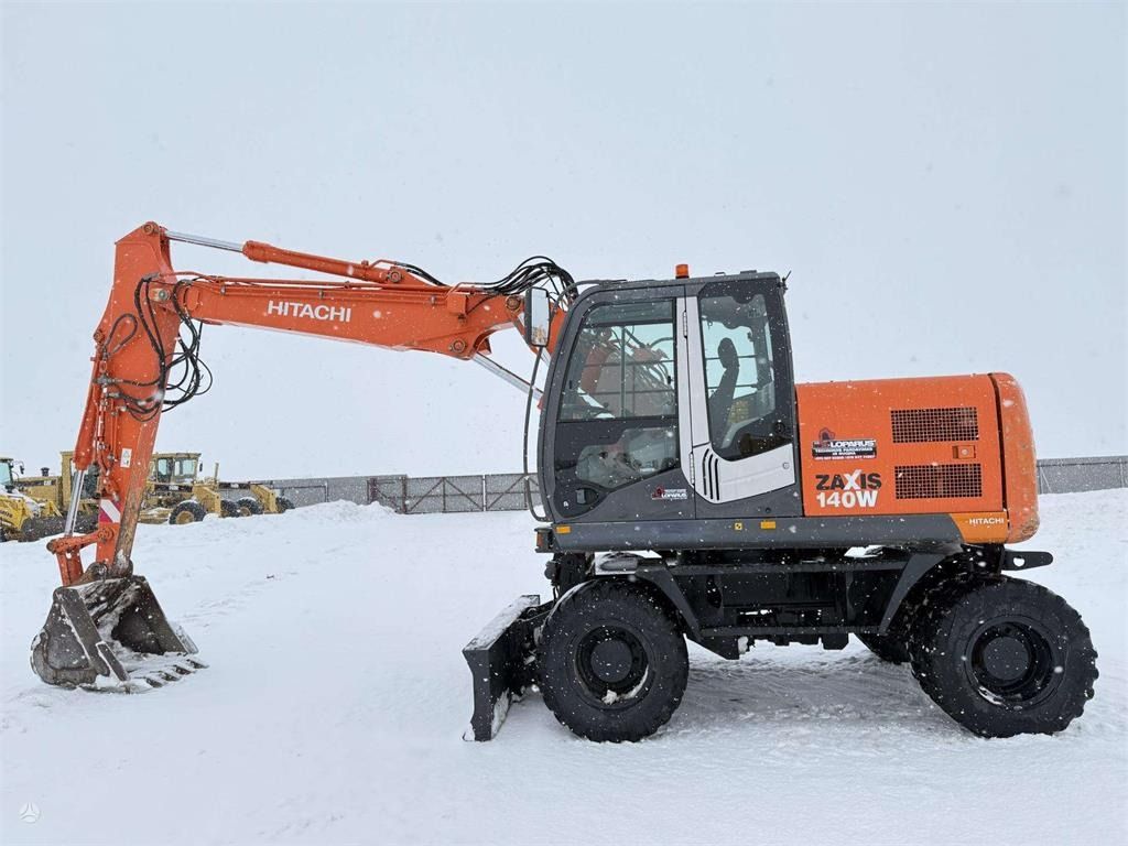 Hitachi ZX 140 W - Ekskavator roda: gambar 2 Hitachi ZX 140 W - Ekskavator roda: gambar 2