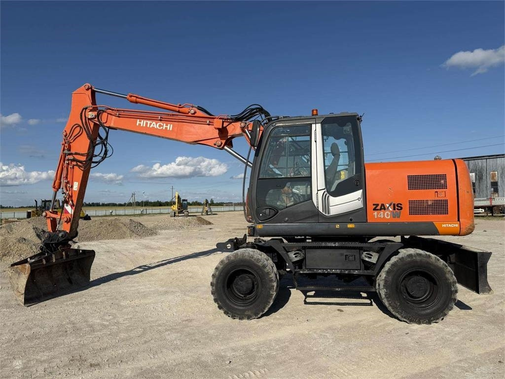 Hitachi ZX 140 W - Ekskavator roda: gambar 3 Hitachi ZX 140 W - Ekskavator roda: gambar 3