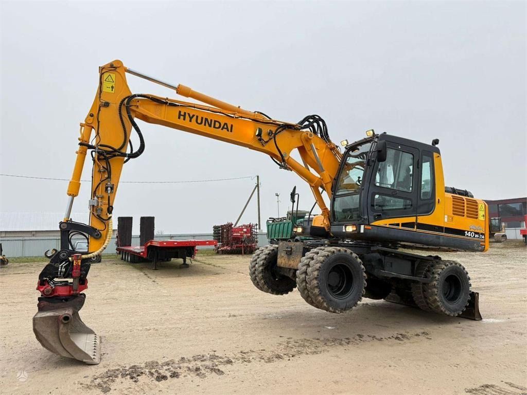 Hyundai Robex 140 W-7A ROTOTILT - Ekskavator roda: gambar 1 Hyundai Robex 140 W-7A ROTOTILT - Ekskavator roda: gambar 1