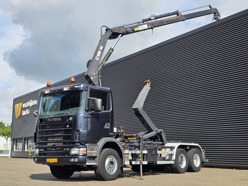 Scania R114.340 6x2 / HIAB CRANE + 25T HOOKLIFT - Hook lift, Truk derek: gambar 1 Scania R114.340 6x2 / HIAB CRANE + 25T HOOKLIFT - Hook lift, Truk derek: gambar 1