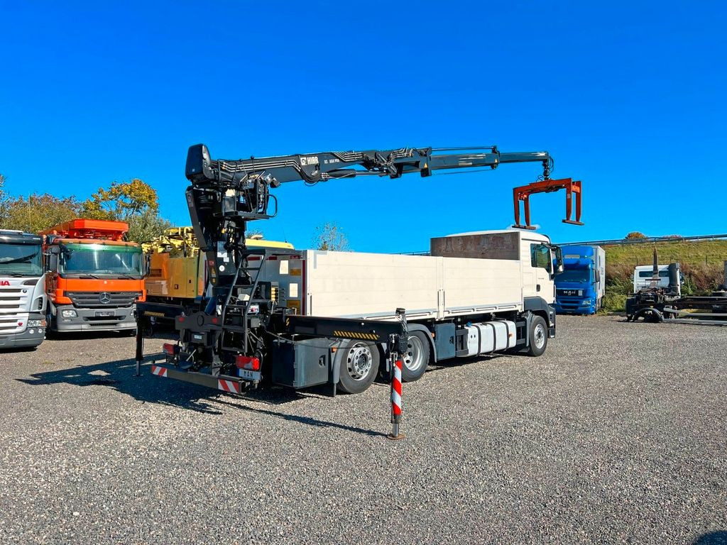 MAN 26.480 6X2 Baustoff mit Kran HIAB Top Zustand - Truk derek, Truk flatbed: gambar 1 MAN 26.480 6X2 Baustoff mit Kran HIAB Top Zustand - Truk derek, Truk flatbed: gambar 1