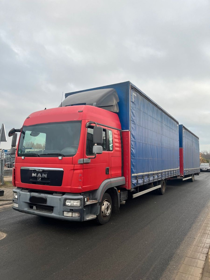 MAN 8.220 4X2 Pritschenwagen - Truk dengan terpal samping: gambar 1 MAN 8.220 4X2 Pritschenwagen - Truk dengan terpal samping: gambar 1