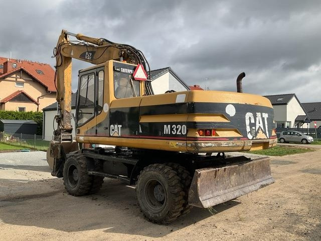 CAT M320 - Ekskavator roda: gambar 3 CAT M320 - Ekskavator roda: gambar 3