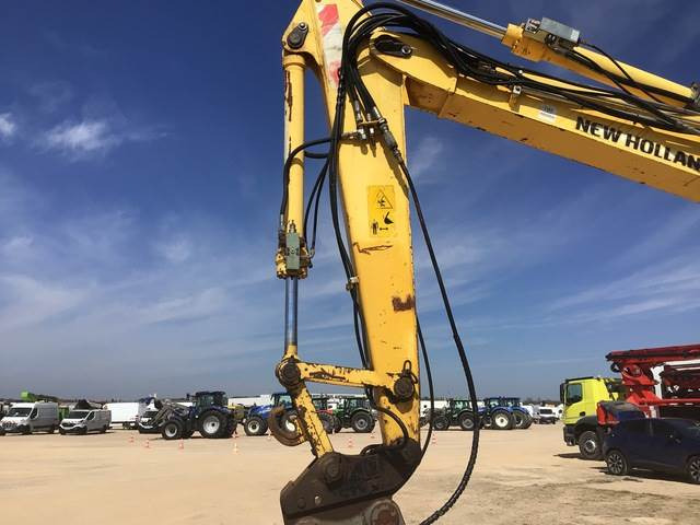 New Holland MH2.6 - Ekskavator roda: gambar 3 New Holland MH2.6 - Ekskavator roda: gambar 3