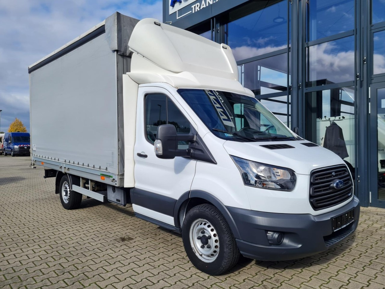 Ford Transit 35 Pritsche Schiebe Plane TDCi KLIMA AHK - Van dengan terpal samping: gambar 4 Ford Transit 35 Pritsche Schiebe Plane TDCi KLIMA AHK - Van dengan terpal samping: gambar 4