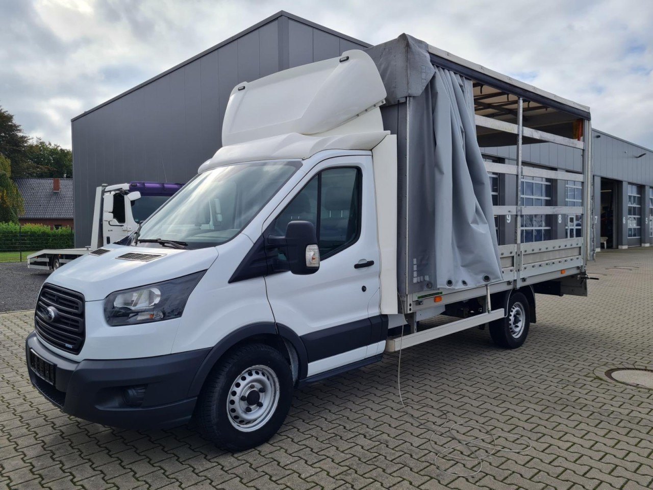 Ford Transit 35 Pritsche Schiebe Plane TDCi KLIMA AHK - Van dengan terpal samping: gambar 2 Ford Transit 35 Pritsche Schiebe Plane TDCi KLIMA AHK - Van dengan terpal samping: gambar 2