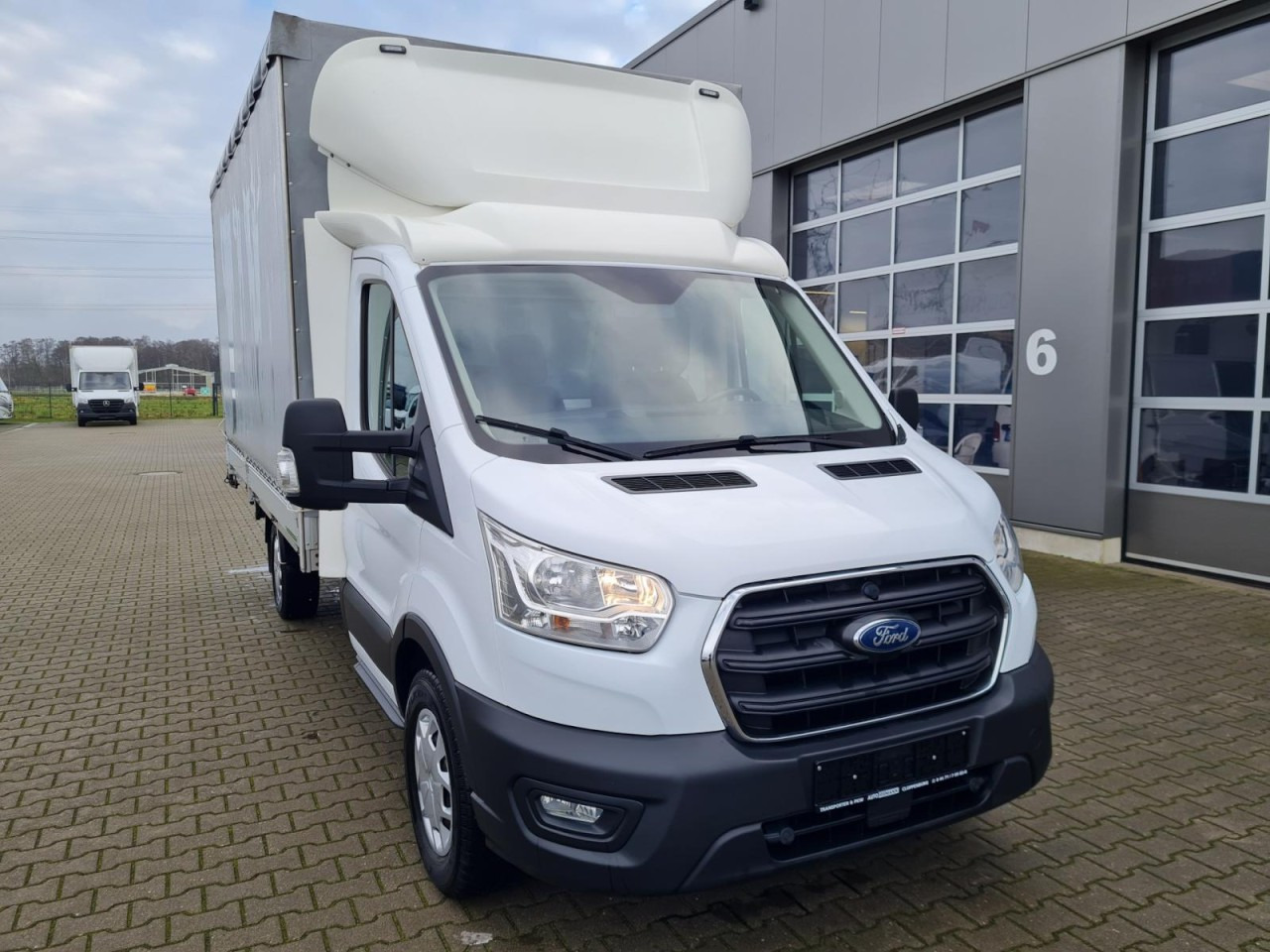 Ford Transit 350 Pritsche TDci Schiebe Plane Trend RWD - Van dengan terpal samping: gambar 2 Ford Transit 350 Pritsche TDci Schiebe Plane Trend RWD - Van dengan terpal samping: gambar 2
