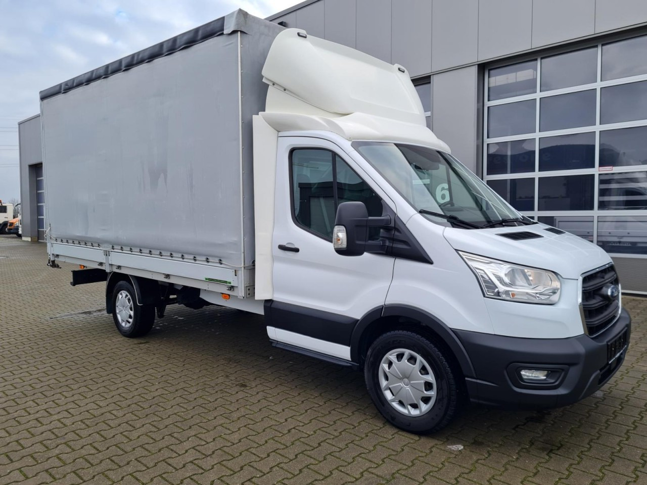 Ford Transit 350 Pritsche TDci Schiebe Plane Trend RWD - Van dengan terpal samping: gambar 3 Ford Transit 350 Pritsche TDci Schiebe Plane Trend RWD - Van dengan terpal samping: gambar 3