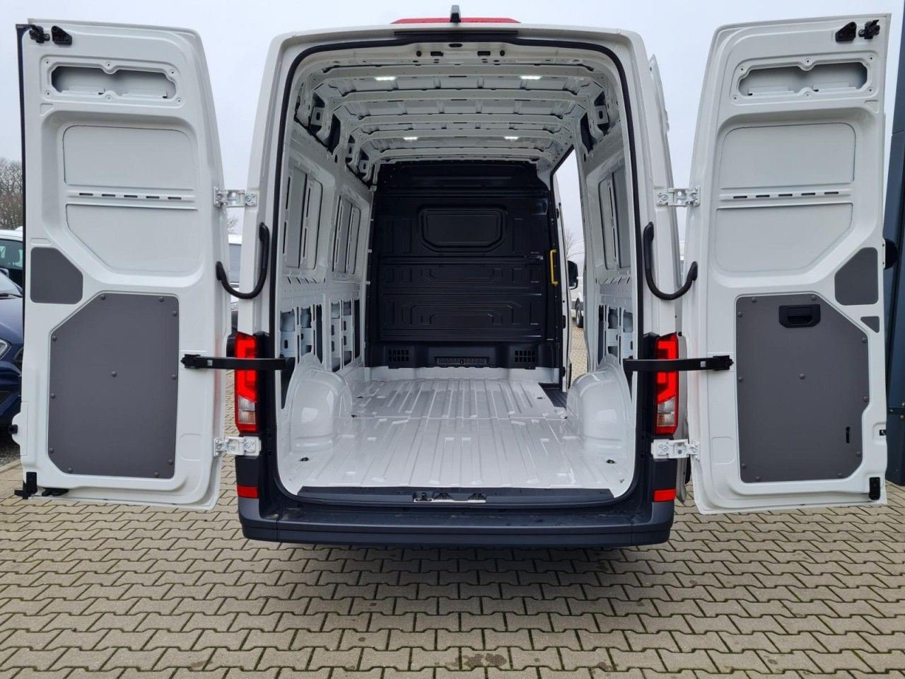 Volkswagen Crafter 35 Kasten MR hoch KLIMA KAMERA NAVI/APP - Van panel: gambar 5 Volkswagen Crafter 35 Kasten MR hoch KLIMA KAMERA NAVI/APP - Van panel: gambar 5