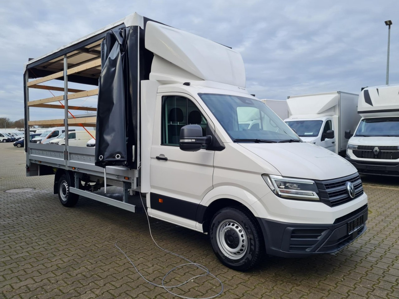 Volkswagen Crafter 35 Pritsche TDI Schiebe Plane L4 - Van dengan terpal samping: gambar 4 Volkswagen Crafter 35 Pritsche TDI Schiebe Plane L4 - Van dengan terpal samping: gambar 4