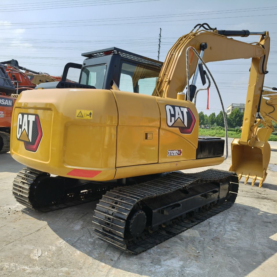 CATERPILLAR 312D2 - Ekskavator: gambar 1 CATERPILLAR 312D2 - Ekskavator: gambar 1