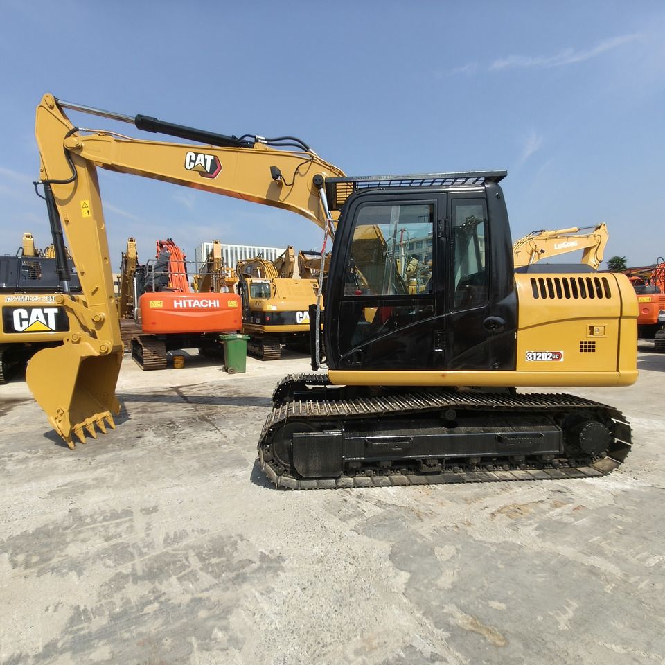 CATERPILLAR 312D2 - Ekskavator: gambar 2 CATERPILLAR 312D2 - Ekskavator: gambar 2
